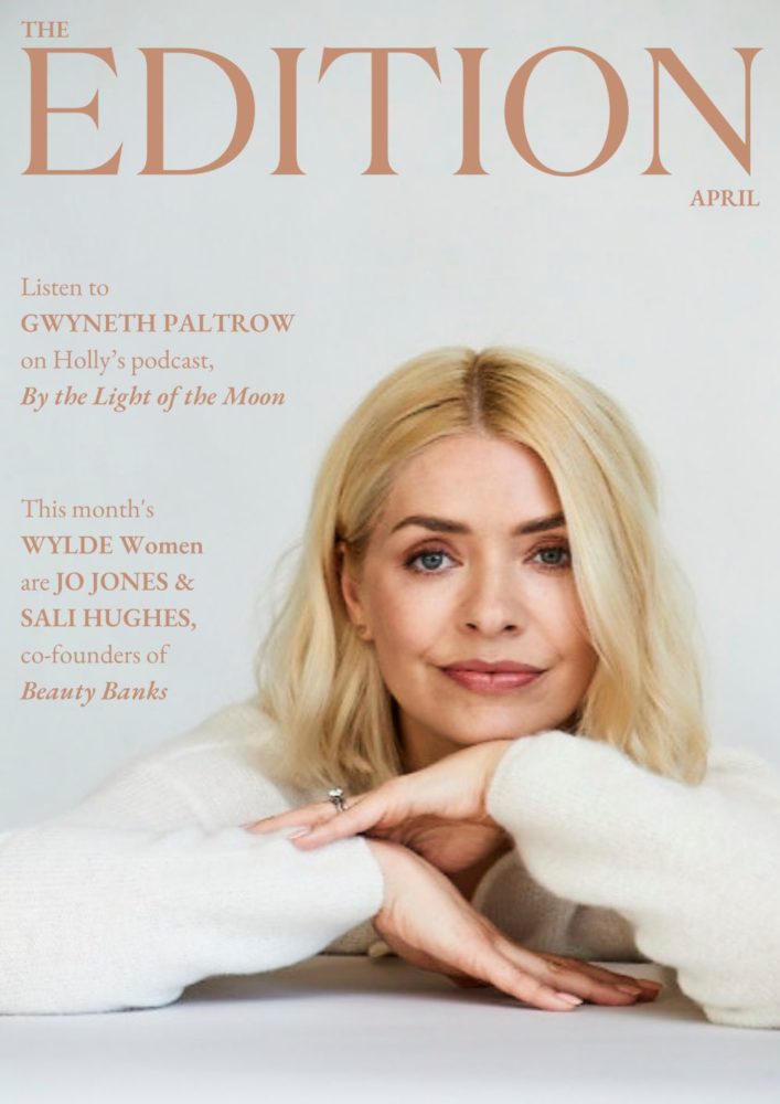 Holly Willoughby wearing a white jumper and folding her arms
