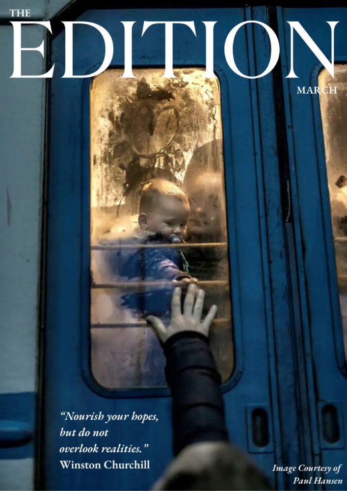 Ukrainian woman and child escape the war on a train