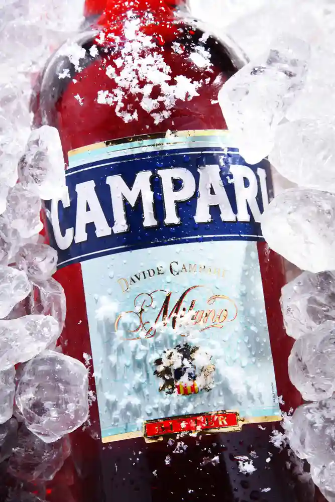Bottle of Campari surrounded by ice